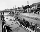34 . WORKING ON A CANAL, OSAKA